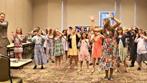 a group of children dancing