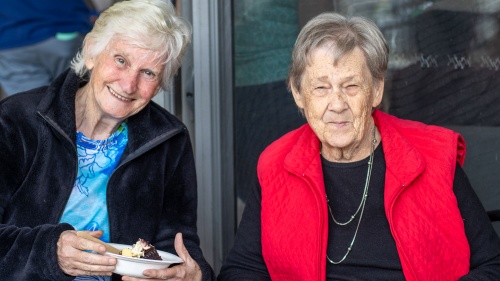 two ladies smiling