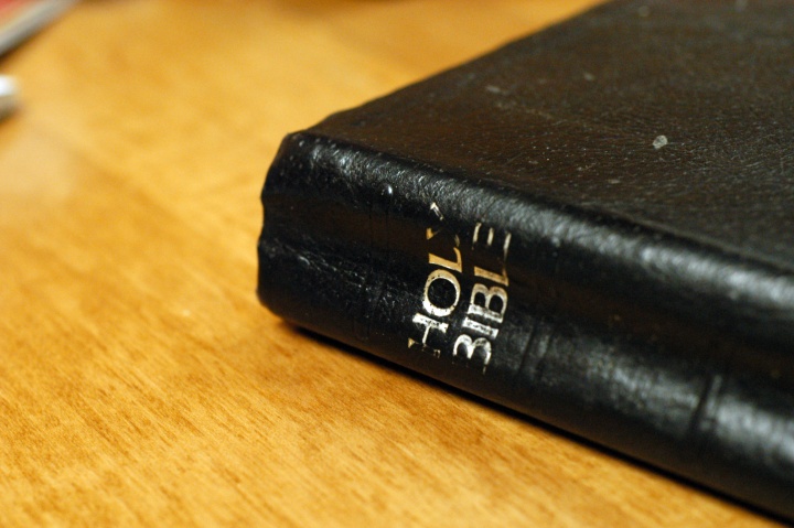 A Bible on a table.